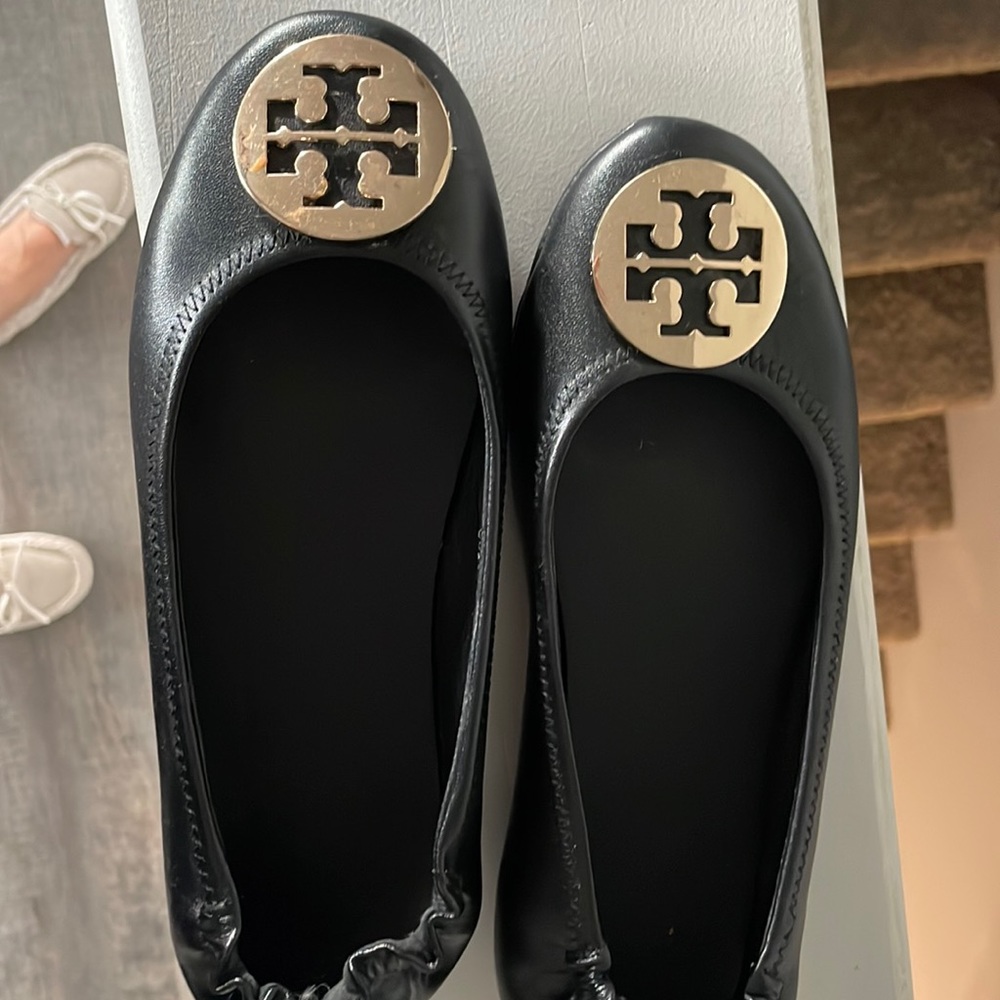Tory Burch flat with gold Tory Burch emblem very light wear
